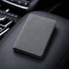 車内に置かれたAlcantara®製のコンパクト電子車検証ケース